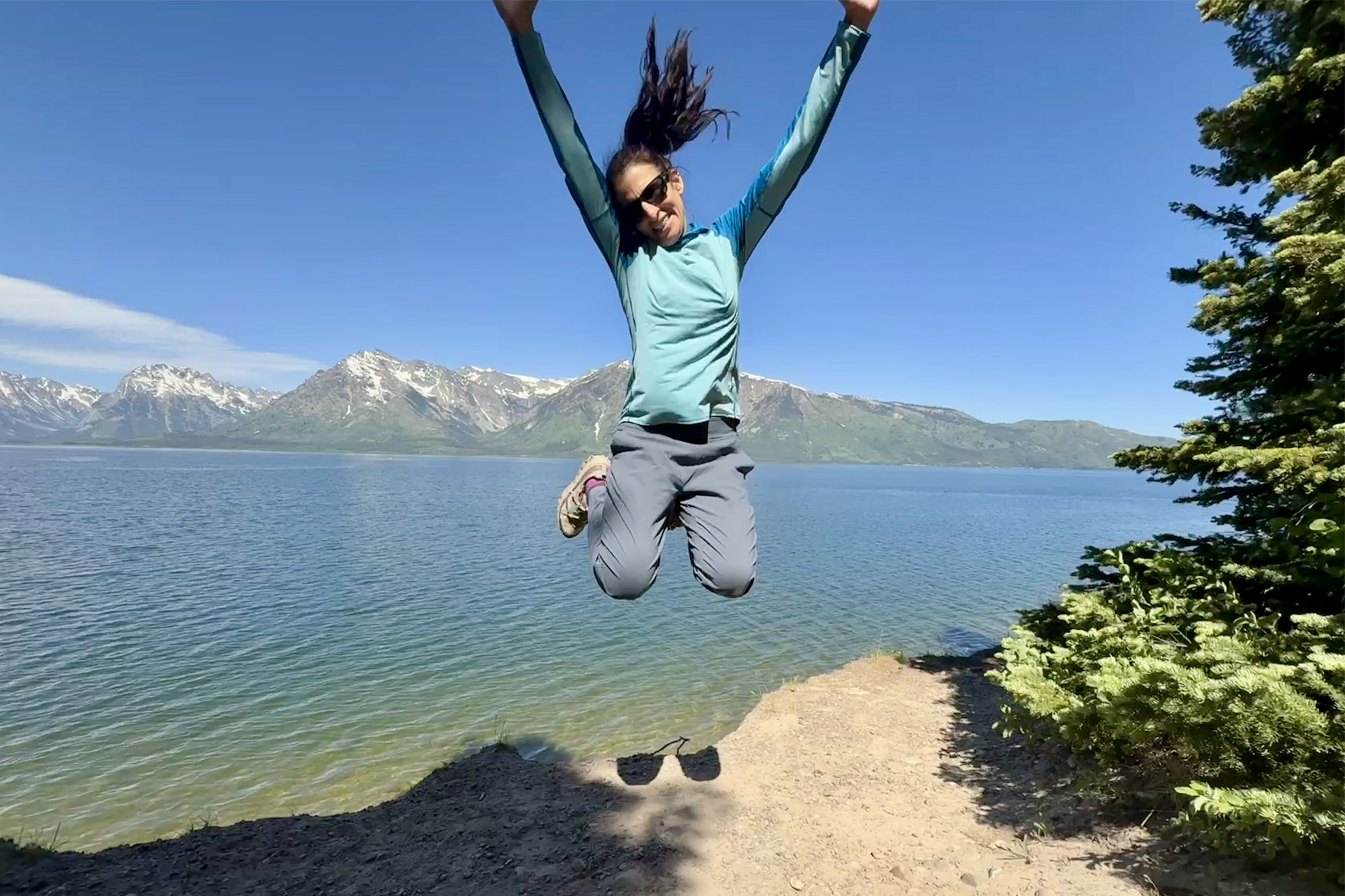 jumping in Mountain Hardwear Dynama Ankle Pants