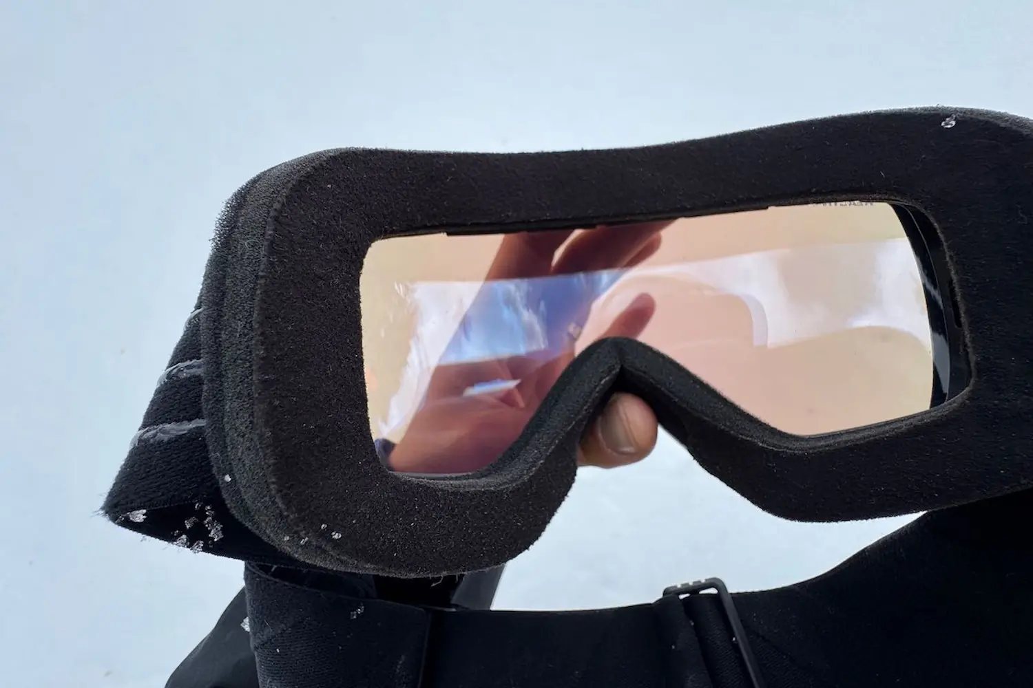 View of the inside of a pair of Julbo Cyrius ski goggles, showing the foam padding and photochromic lens