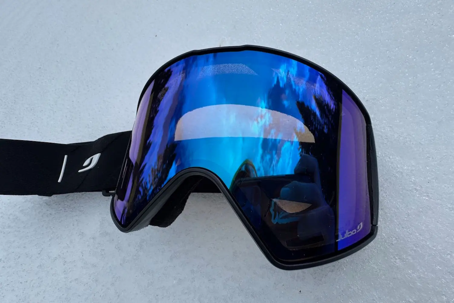 Julbo Cyrius Goggles lying on snow