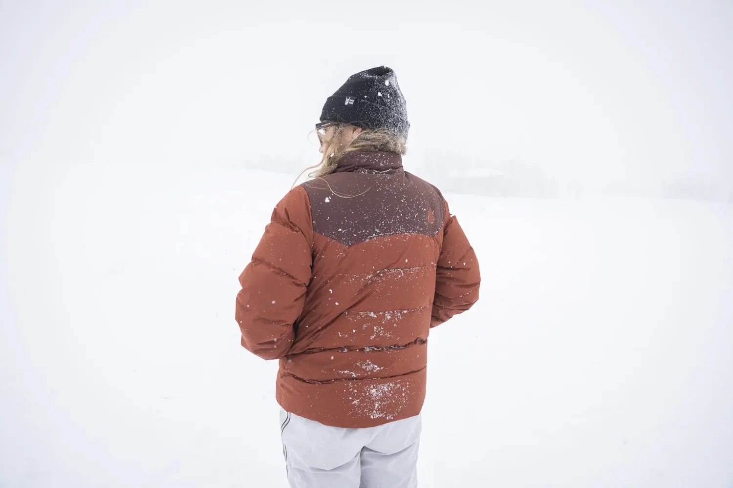 Collar of the Stio Turnbolt Jacket exposed to wind, illustrating the lack of a protective hood