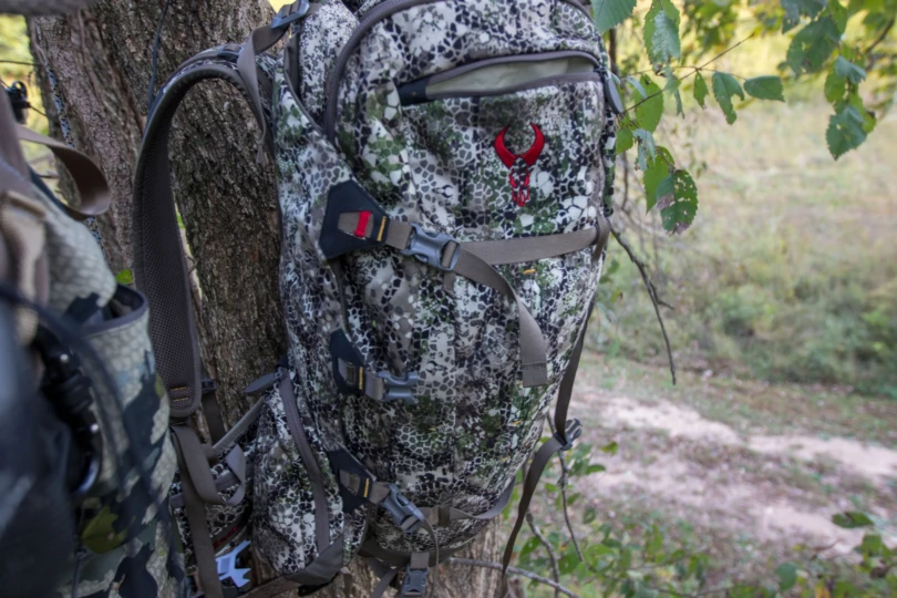 A hunting backpack on a tree