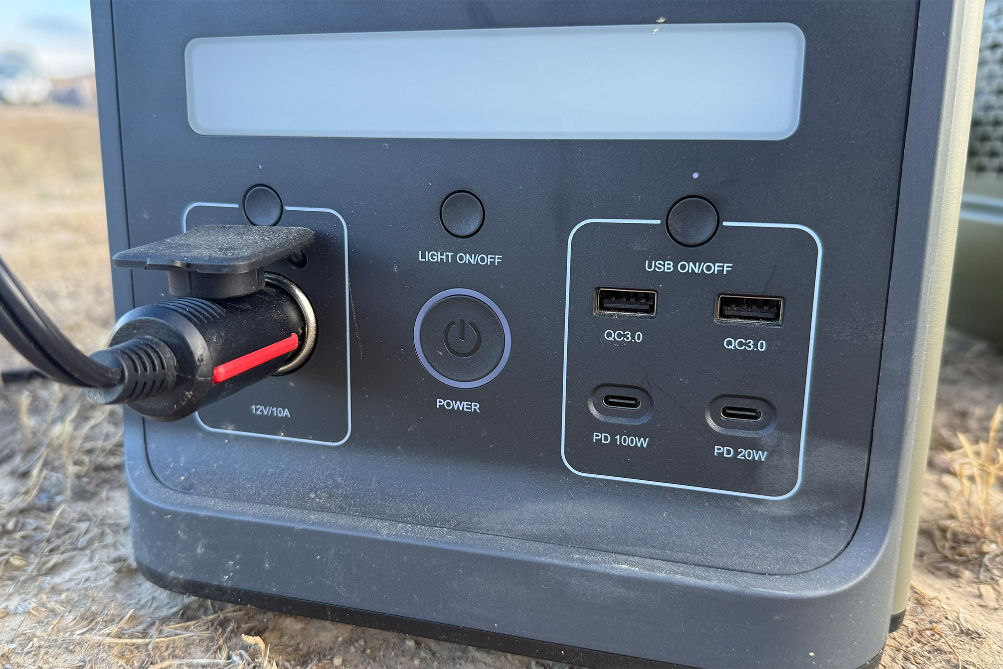 Close-up of the TRAVOCA Vega 1500 power station showing ports and power buttons