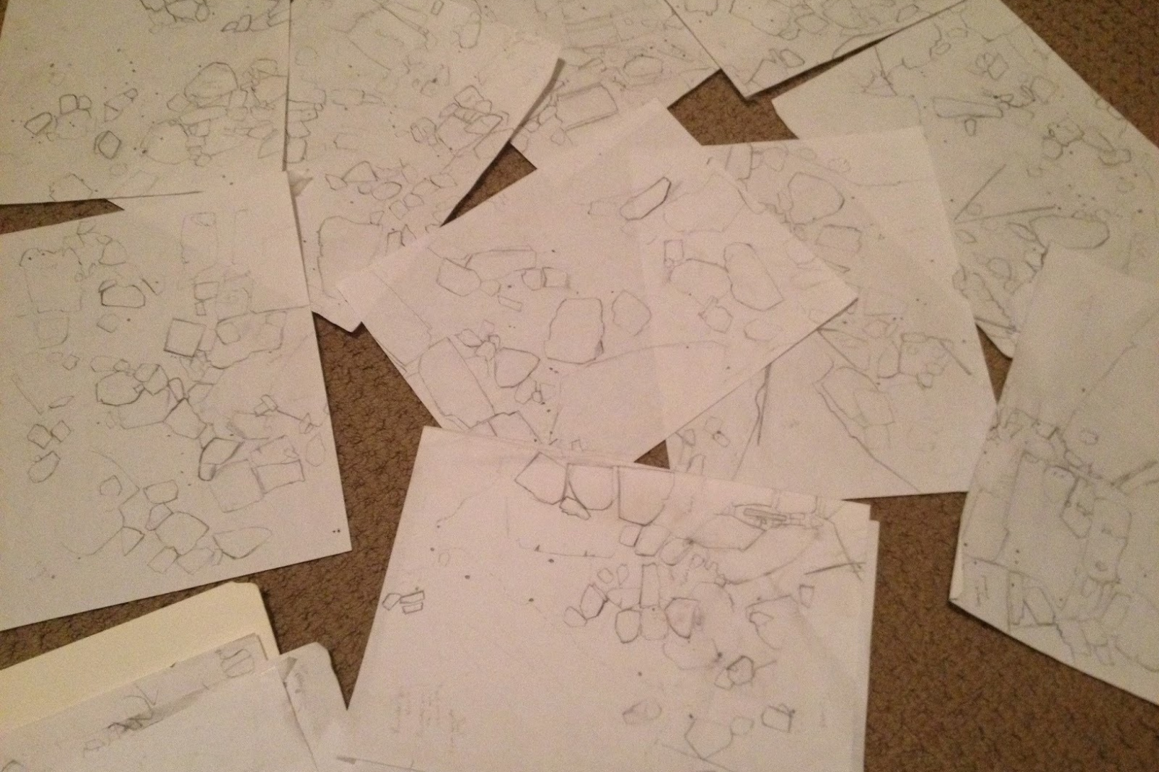 series of maps on white paper