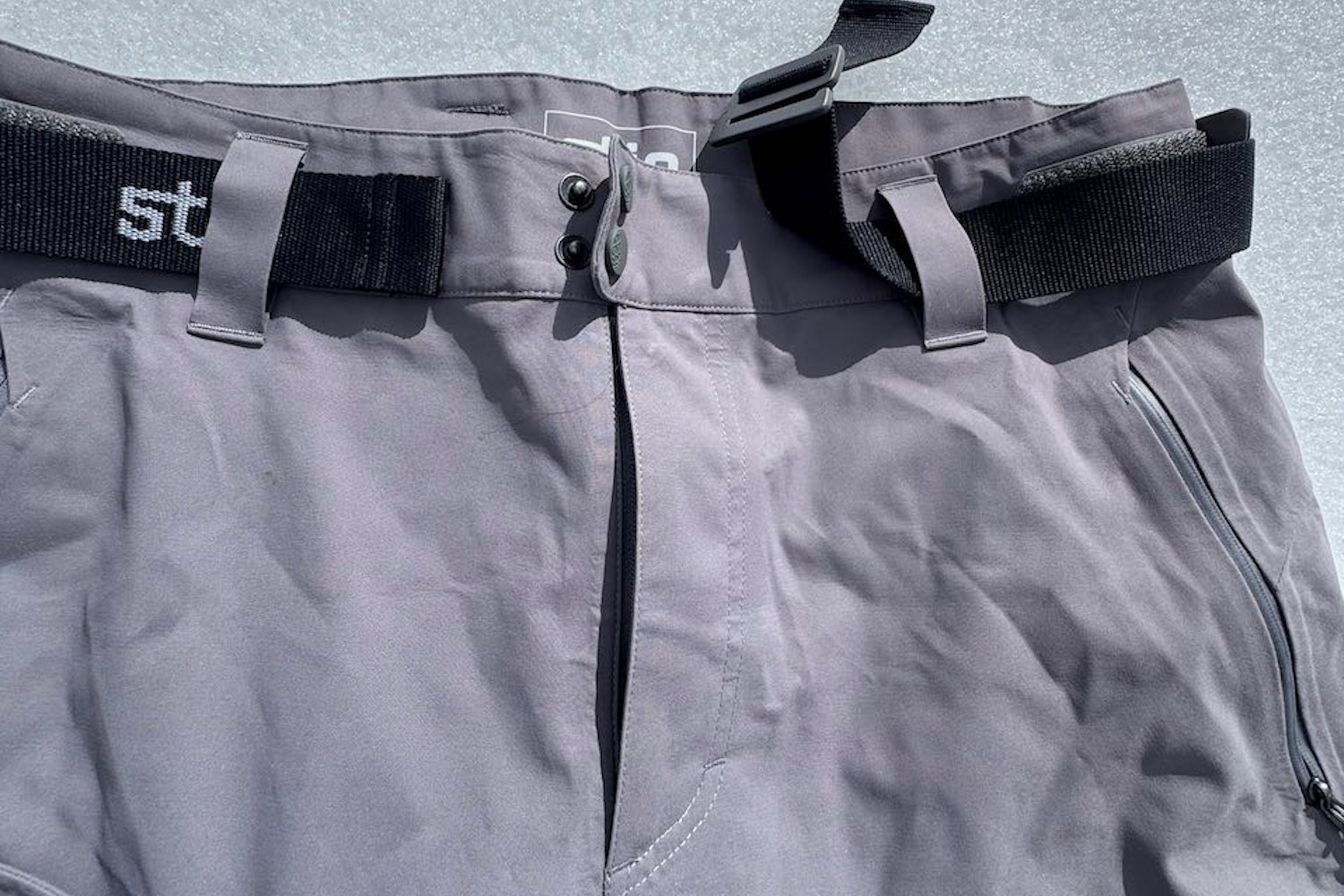 Closeup of Stio environ integrated belt