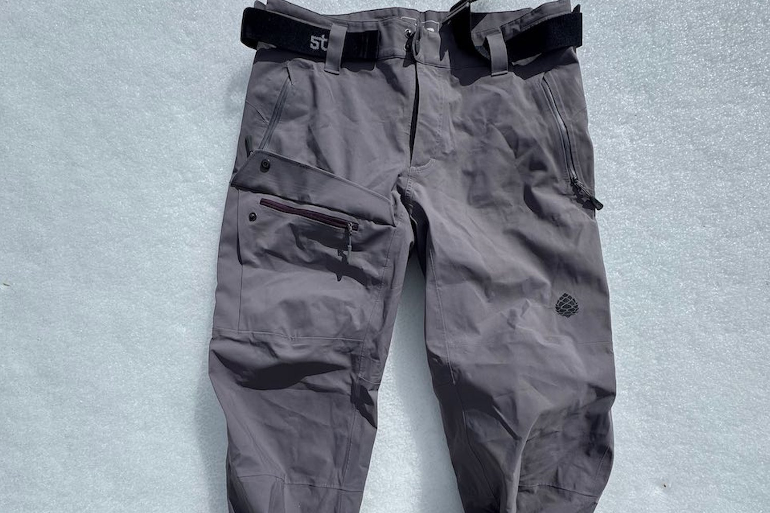Stio environ pants lying on snow