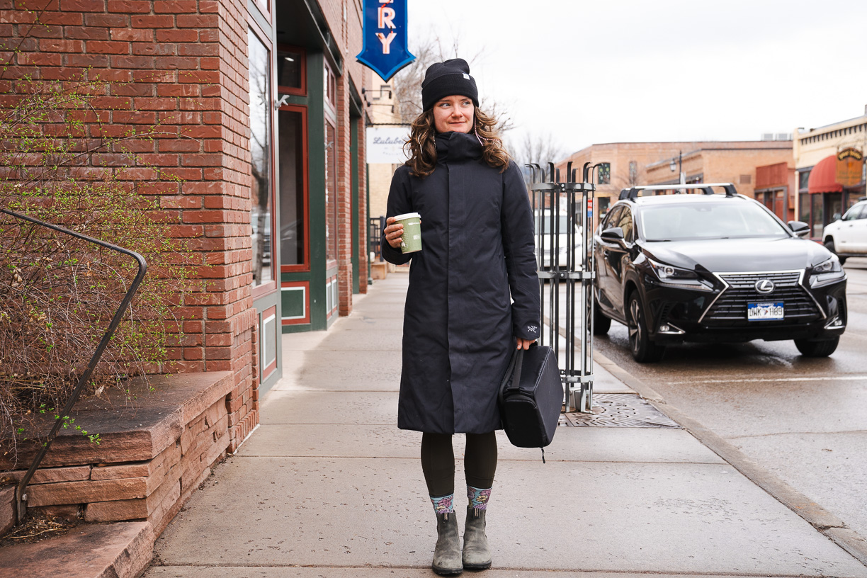 woman wearing the Arc’teryx Patera Parka on a street 