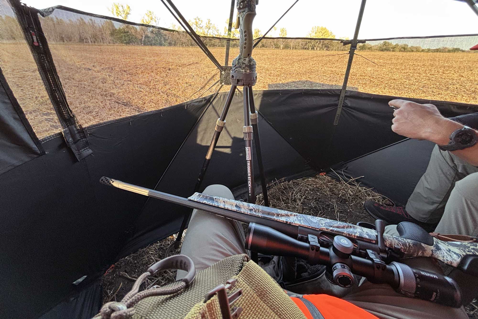 rifle in deer blind