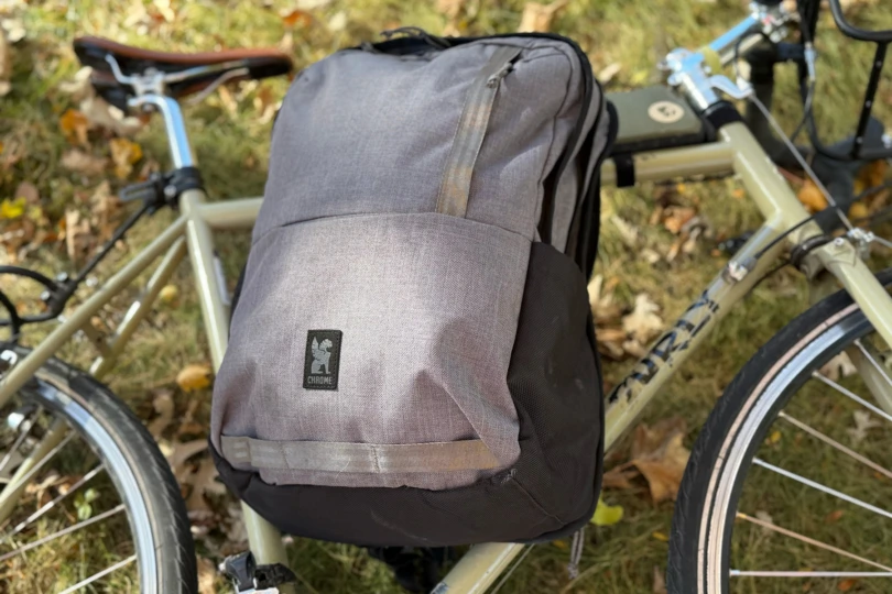 chrome industries backpack on top of bike laying on ground