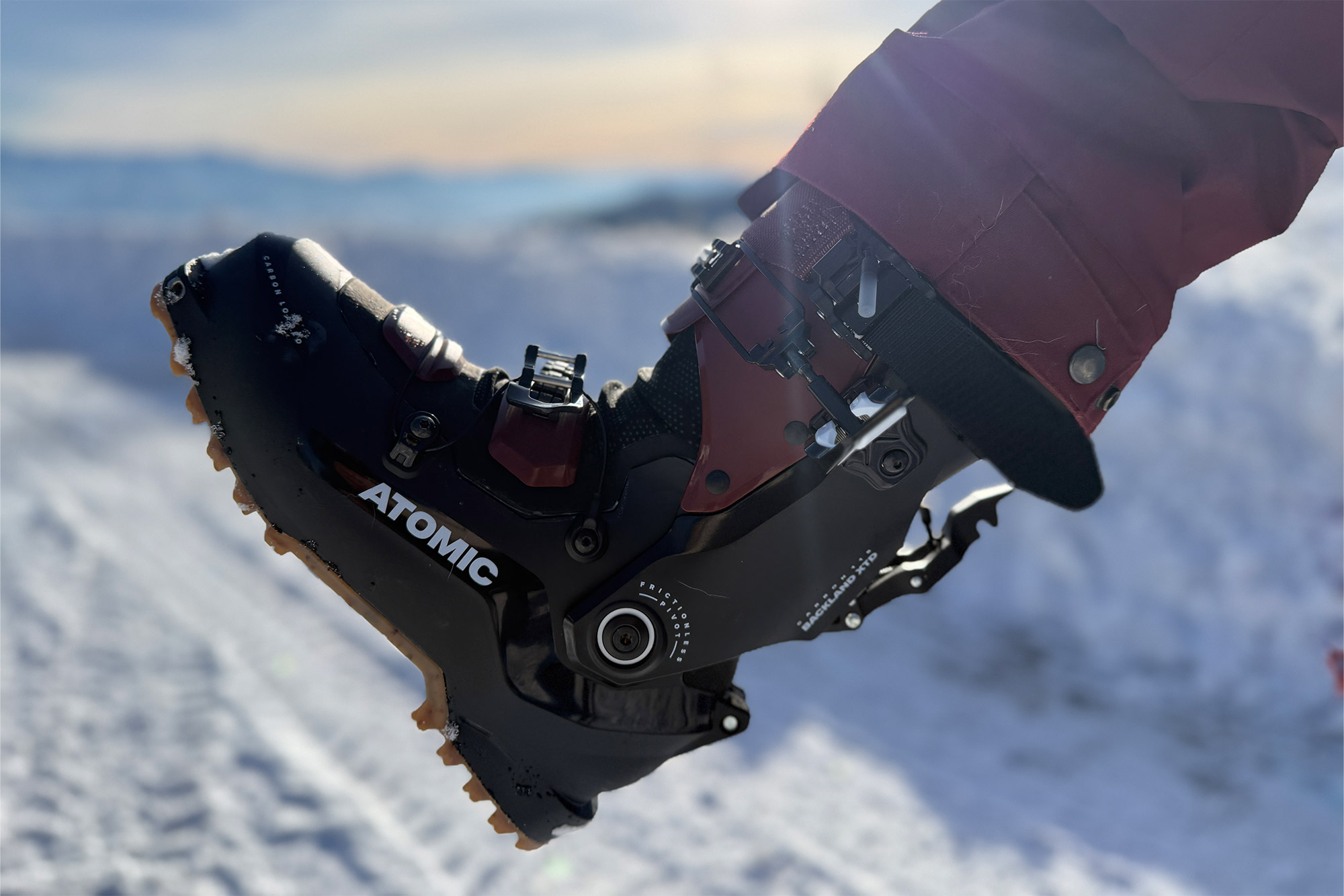 Raising the heel in walk mode while moving across packed snow