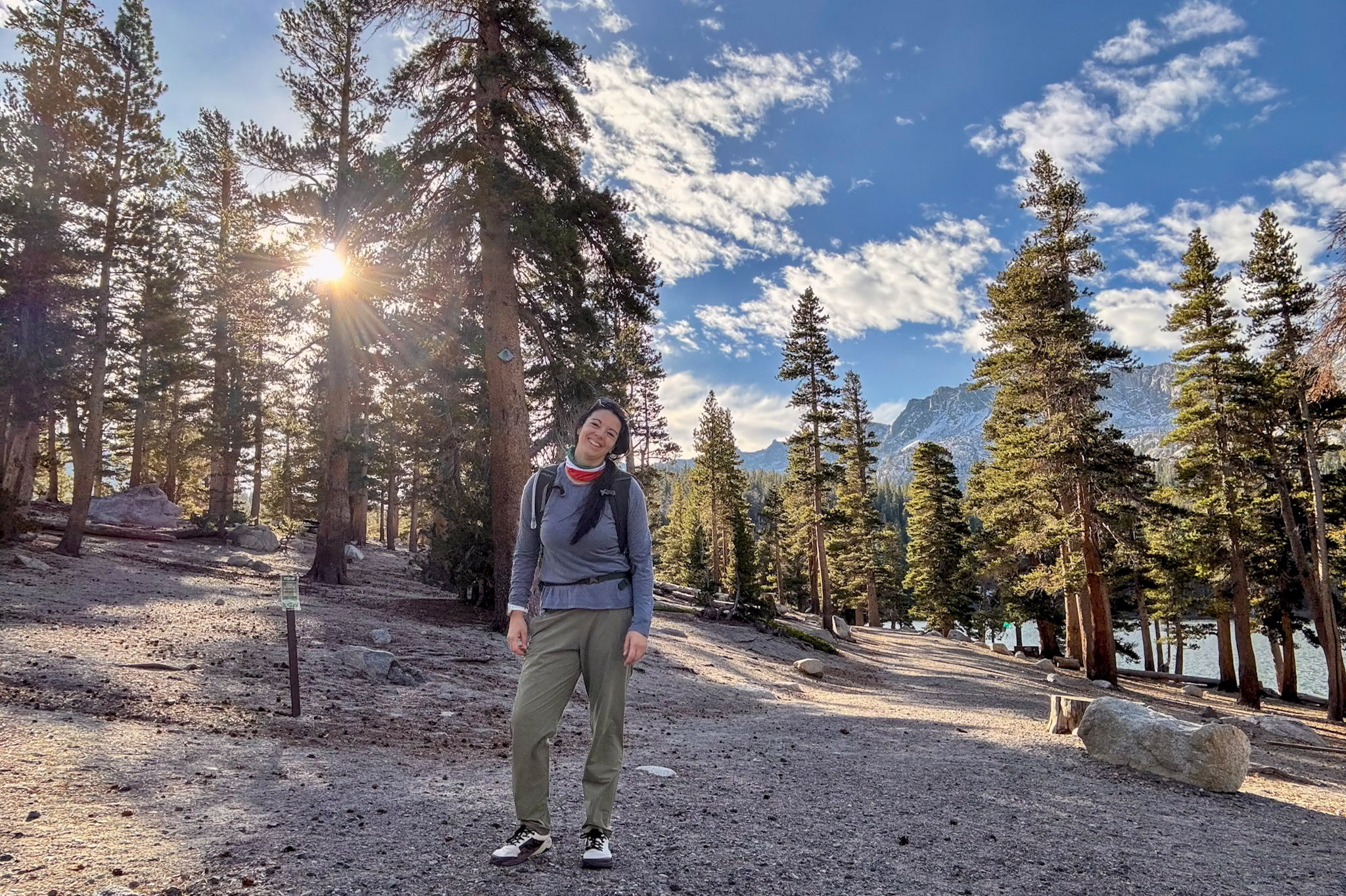 Hiker wearing Notace barefoot shoes on a forest trail