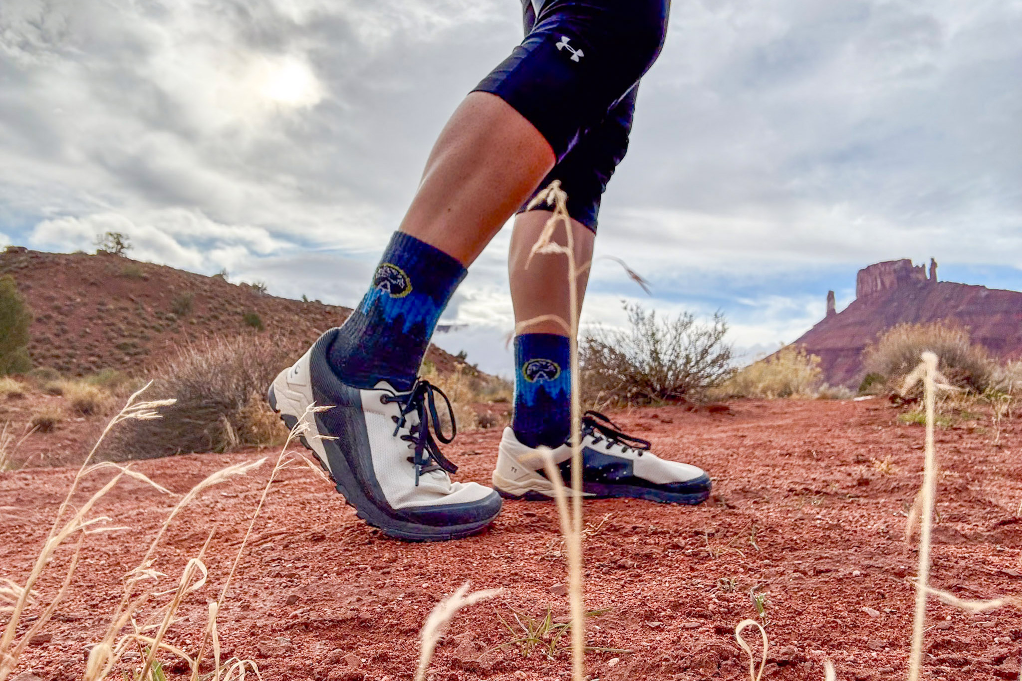 The Women’s Barefoot Shoe moving over red desert rock