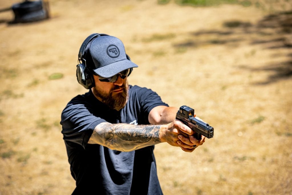 CZ P-10 C Ported pistol on range bench during accuracy testing