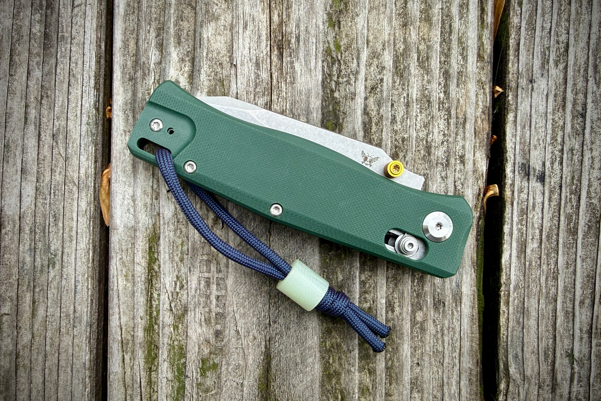 The folded Flytanium folder resting on a wooden surface