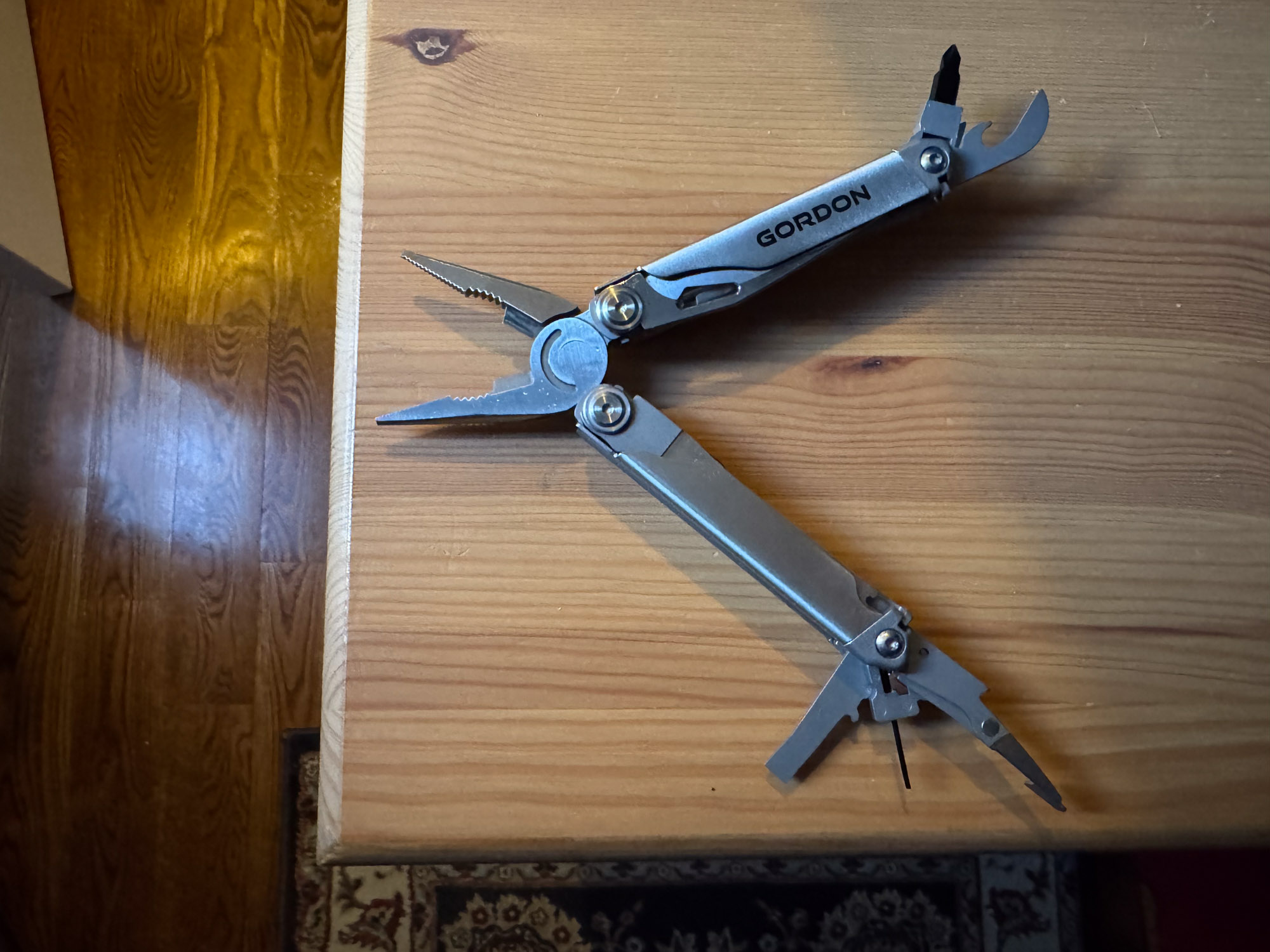 the gordon multitool in the open position with all tools extended