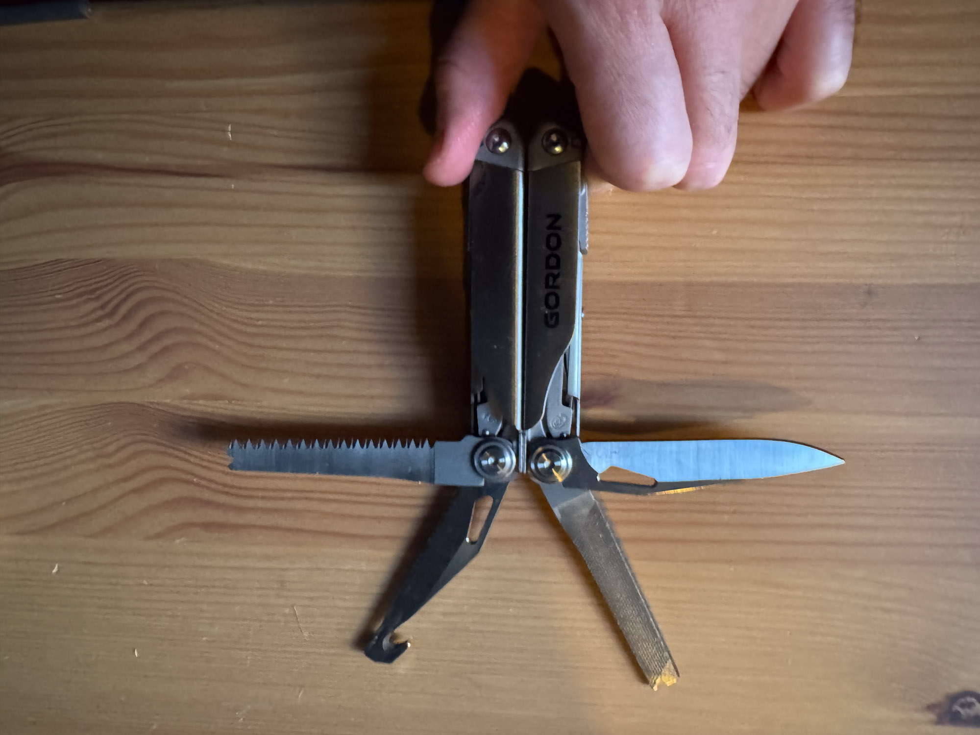 the gordon multitool with the four main tools open