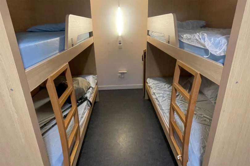 Bunk beds inside a simple pilgrim hostel along the pilgrimage route