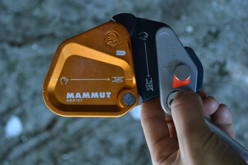 close up shot of orange Mammut climbing device 