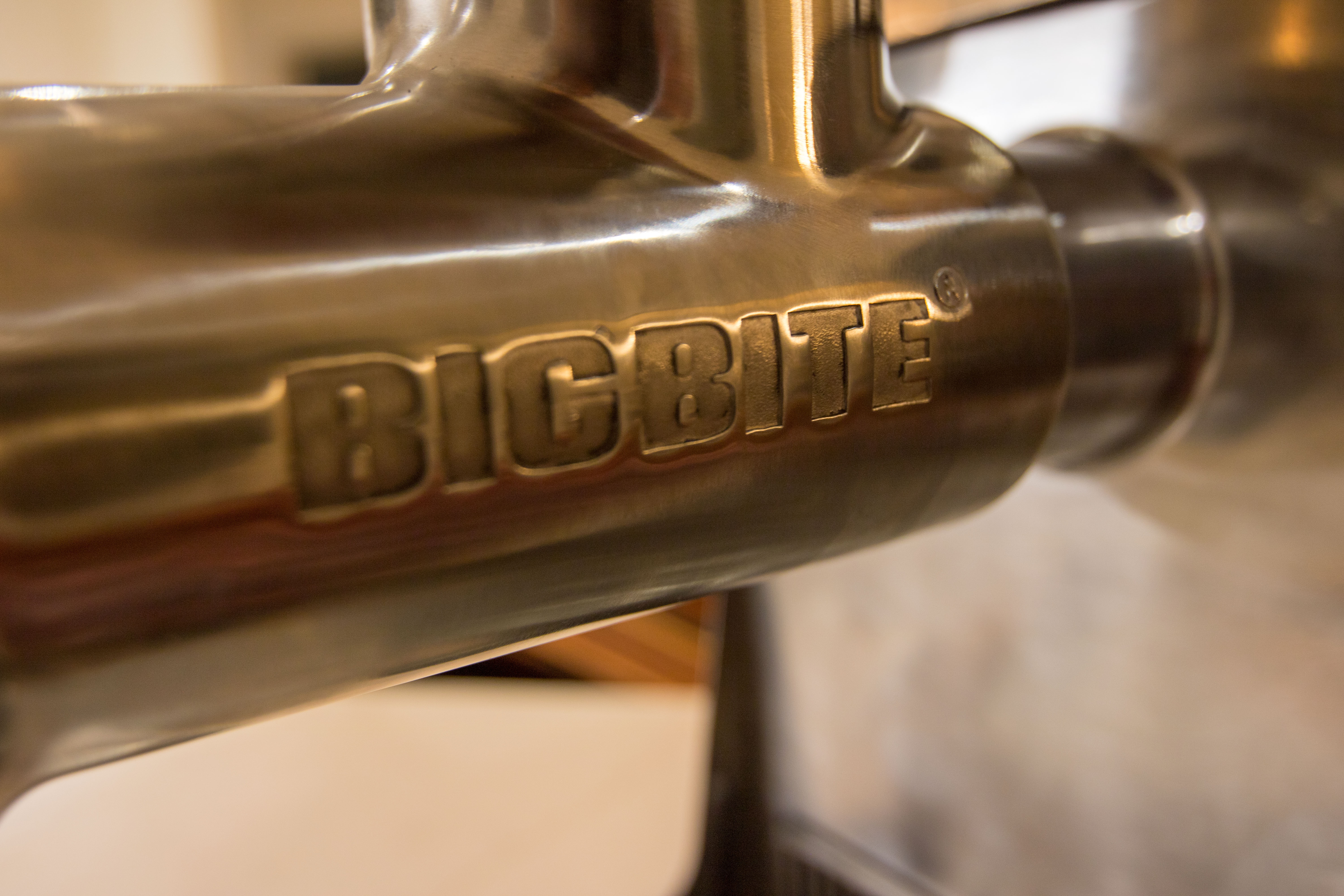 A BIg Bite Logo on the throat of a grinder.