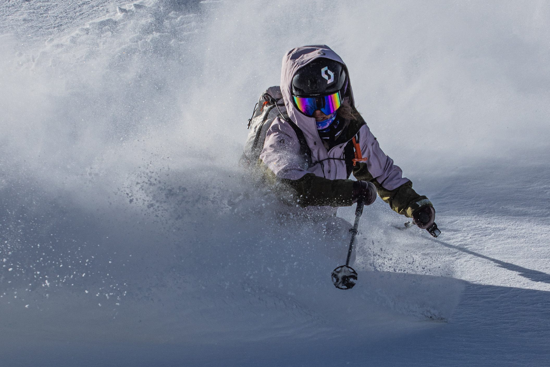 Molly Armanino skiing deep snow