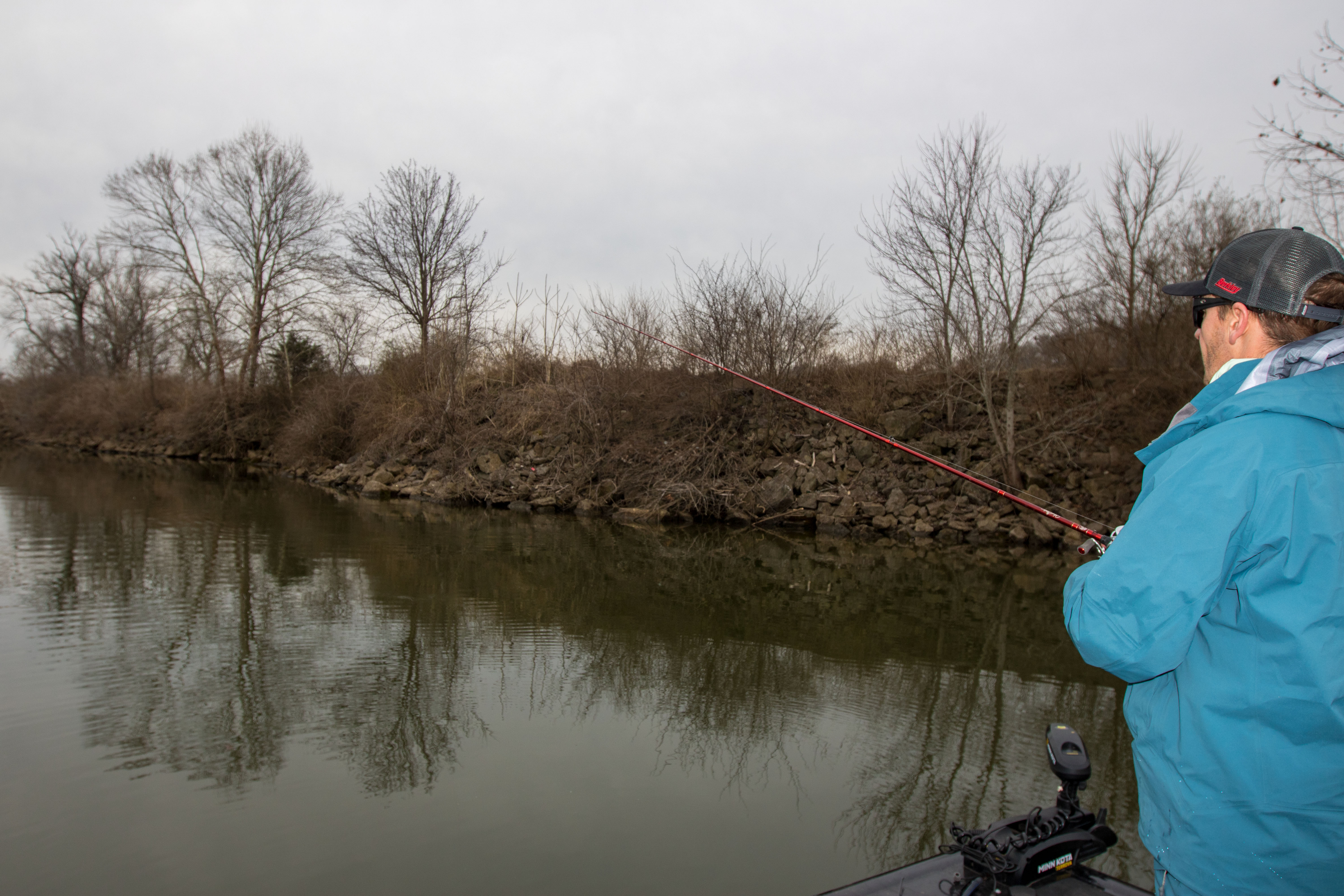 An angler fishing with the Johnny Morris Platinum Signature Rod.