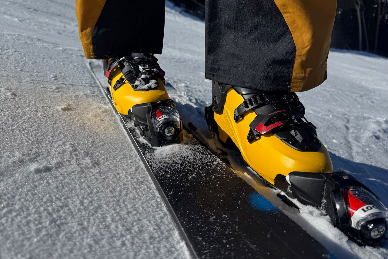 La Sportiva Sender ski boots are clicked into alpine bindings on firm, icy snow
