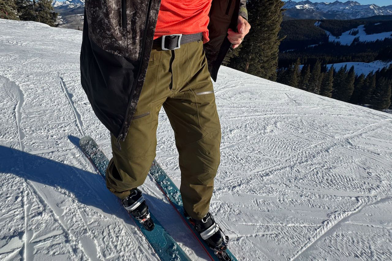 Outdoor Research Powderverse pants worn while standing on a ski slope