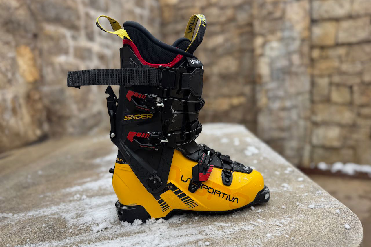 The Sender boot is shown from a lateral angle, displaying buckles, power strap, and shell design