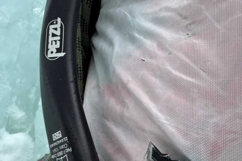 Close-up of the Alpha SL pack fabric and mounted ice tool