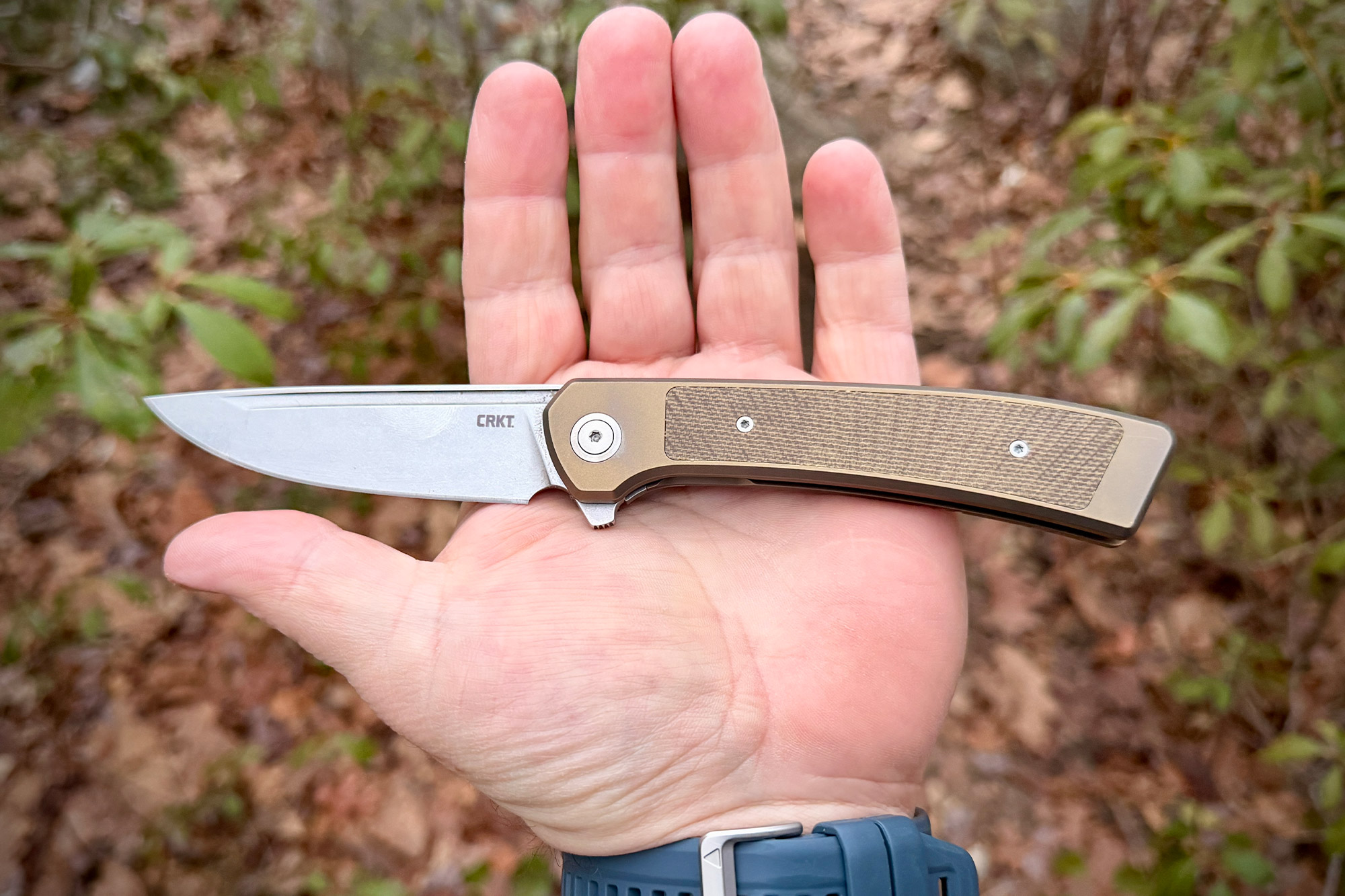 CRKT Q Frame Lock knife resting on a hand showing size and proportions
