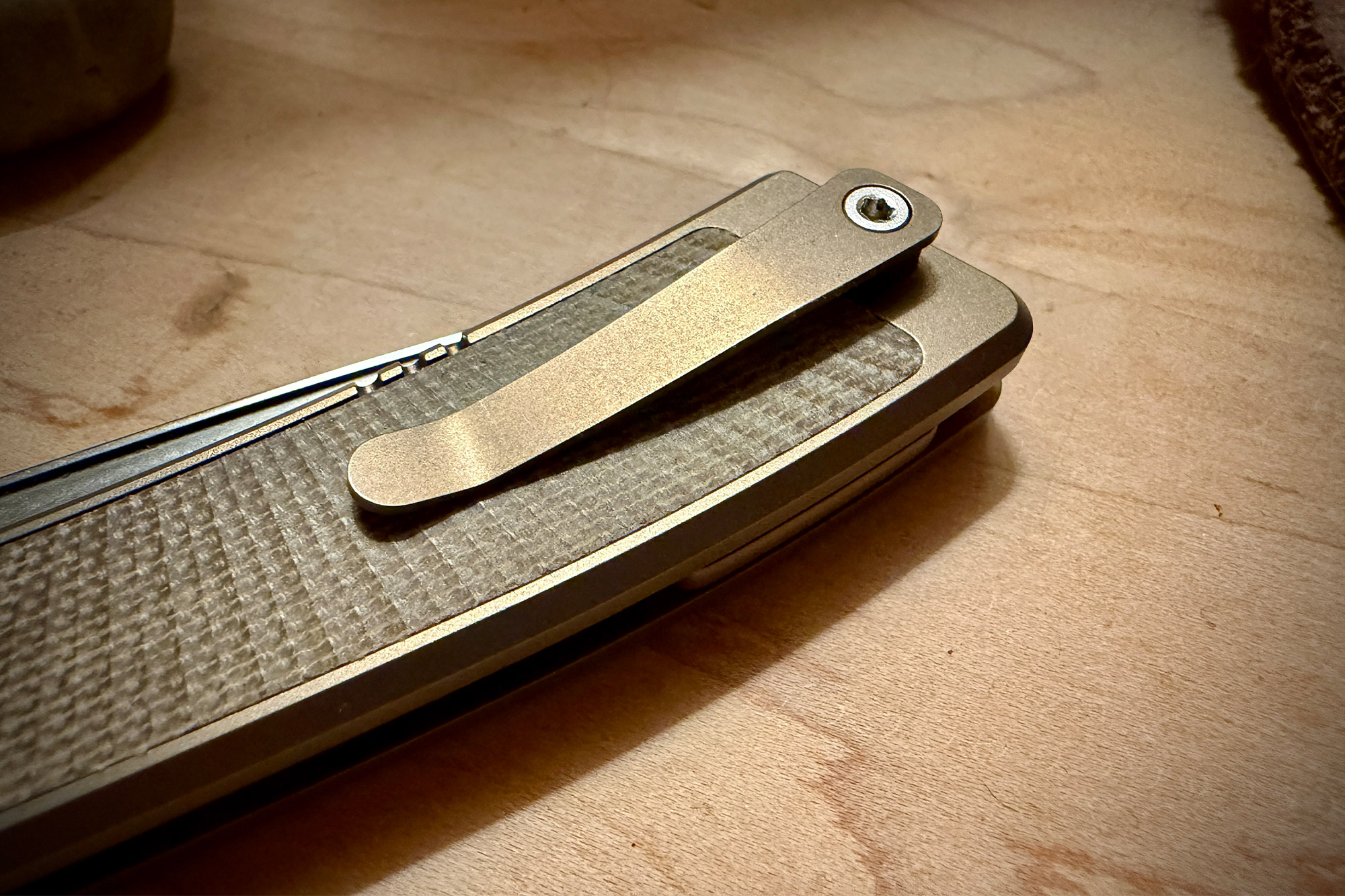 CRKT Q Frame Lock pocket clip detail showing low-profile carry design