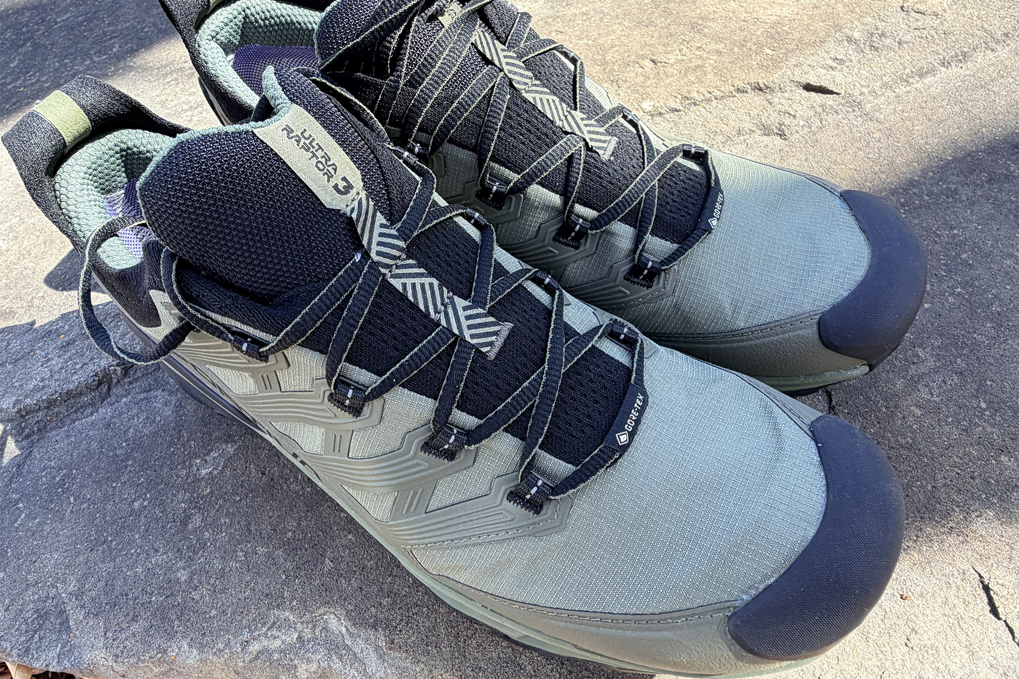 Close view of trail runner upper material and toe protection