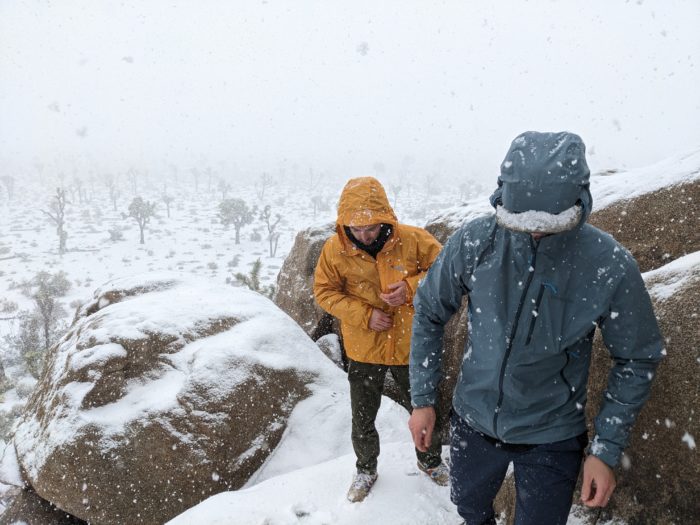 Hikers Scrambling in Joshua Tree National Park in a Snowstorm