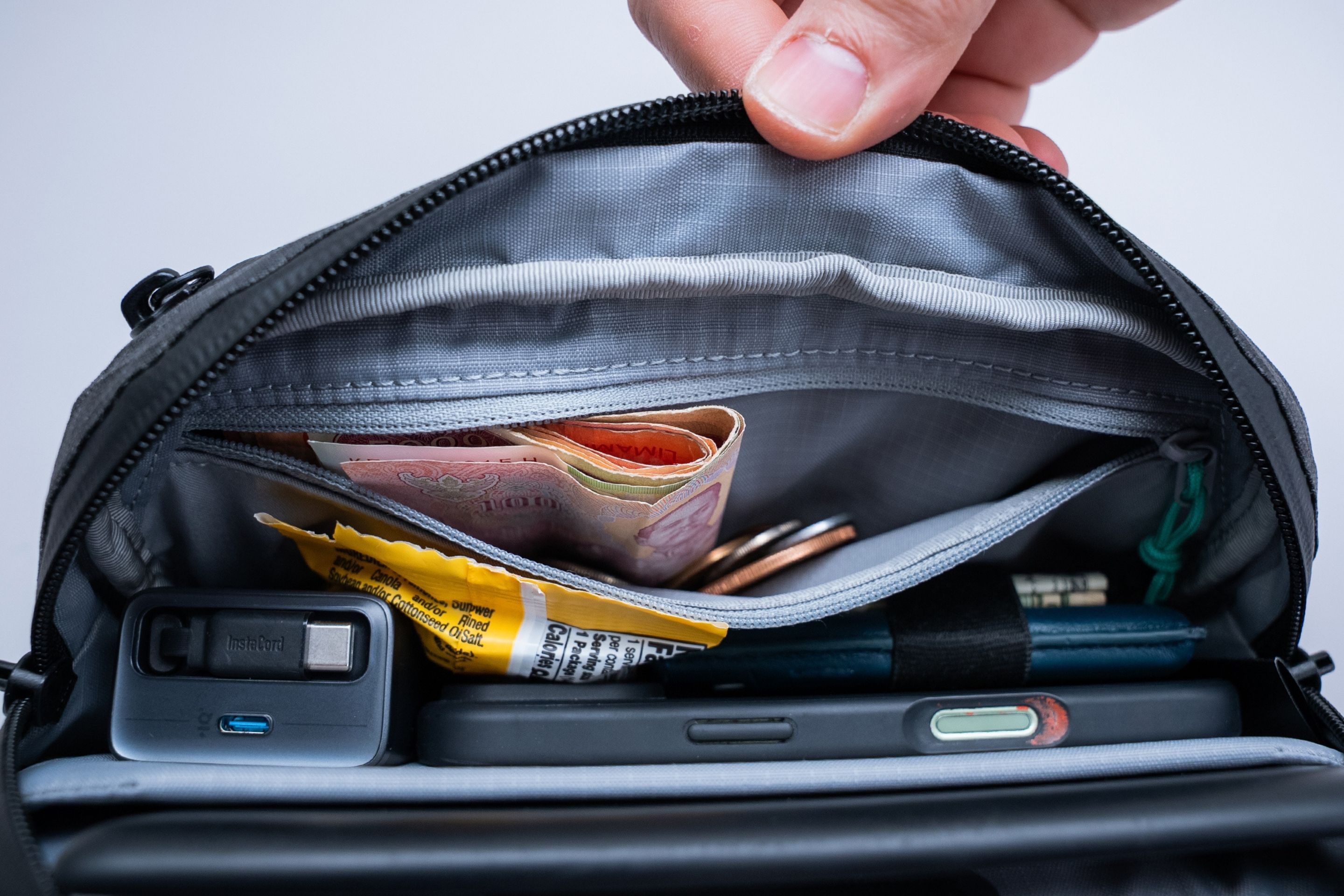 close-up look of pockets on the inside of a bag