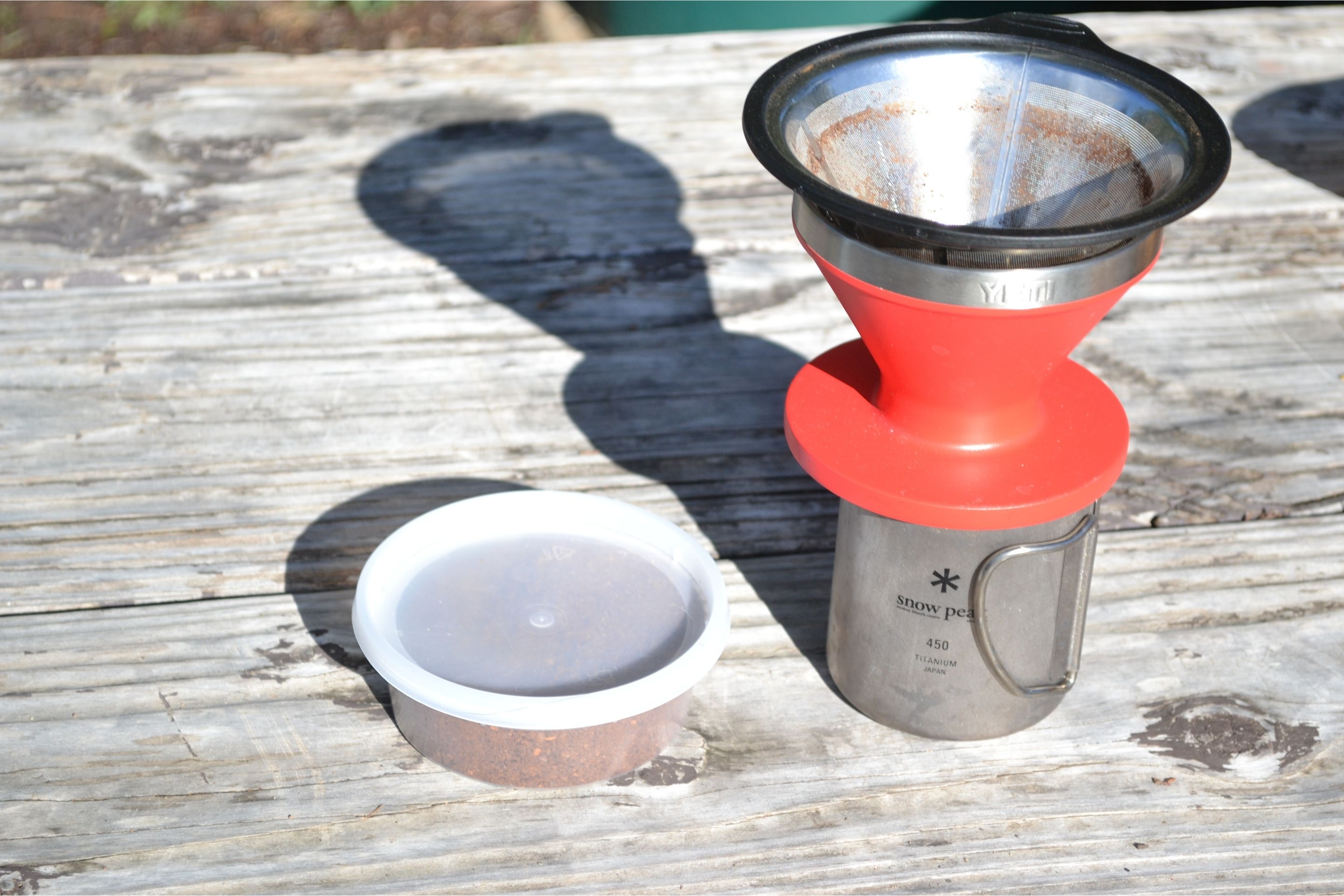 pour over coffee set up on picnic table
