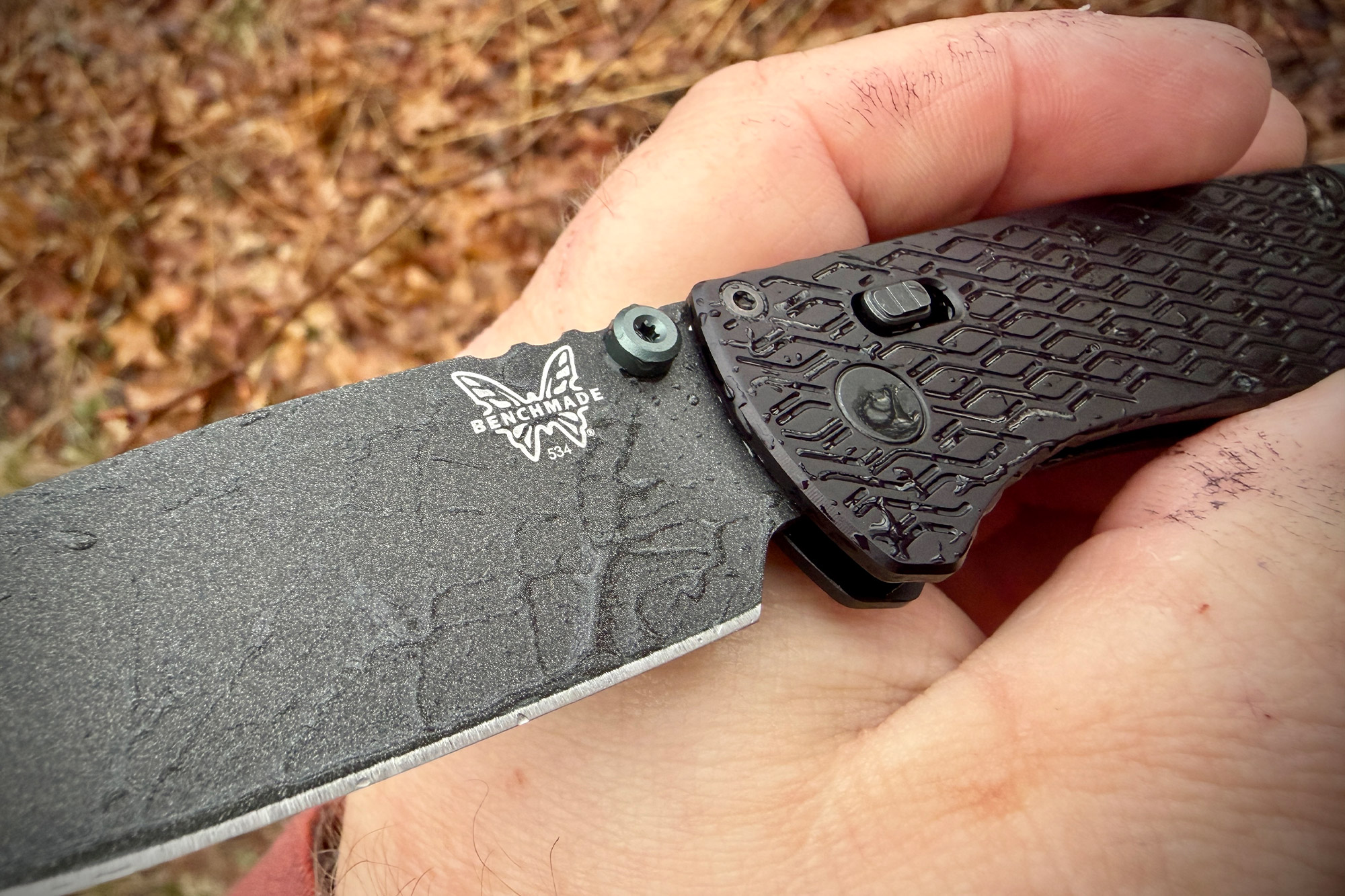 Benchmade Vapyr wet handle and blade showing water resistance in hand