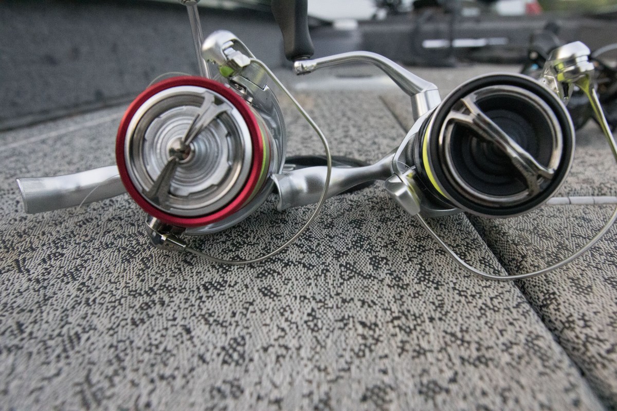 Two of the best bass fishing reels side by side, comparing spool size