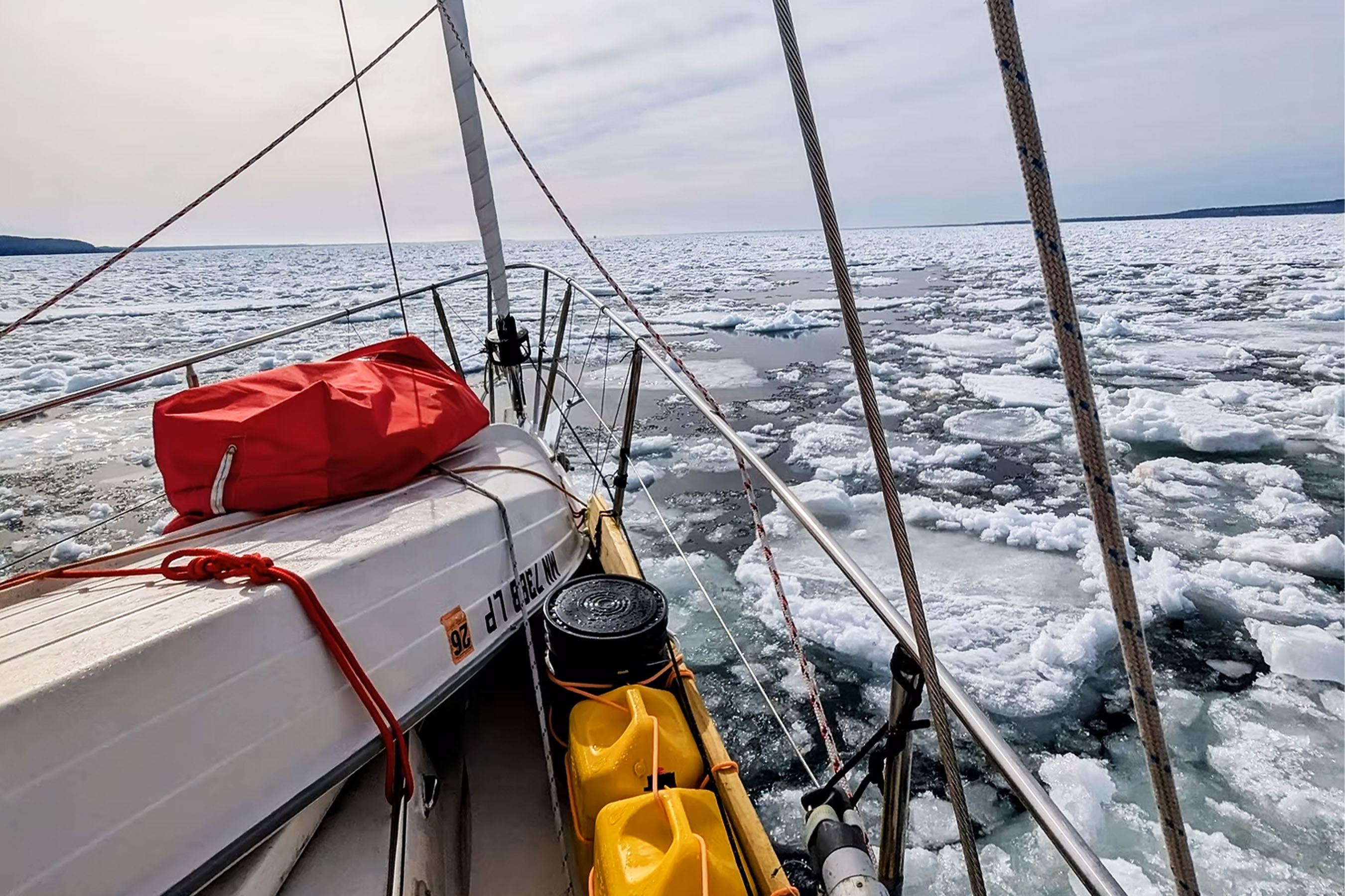 A boat navigates ice on Lake Superior