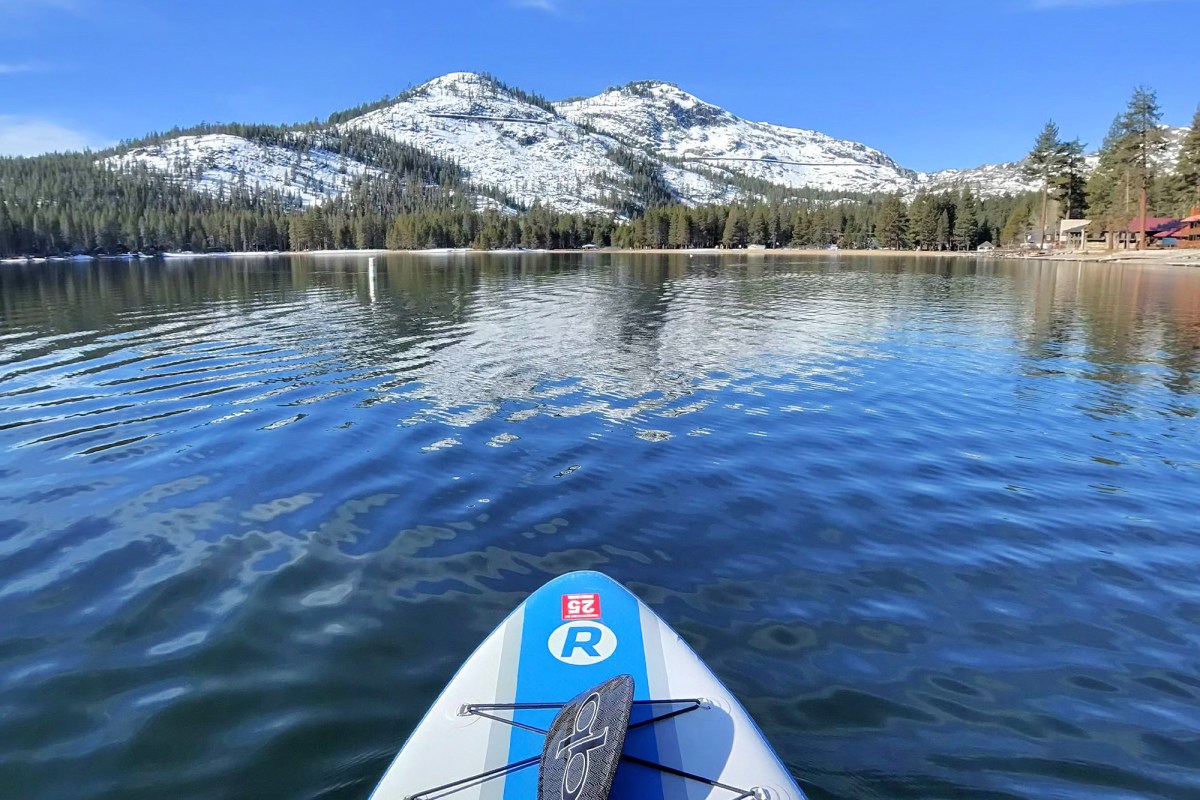 Paddleboard view on a lake with Oakley Meta glasses worn