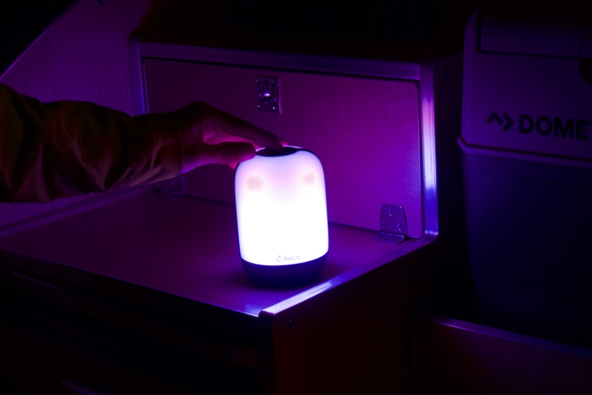 the BioLite AlpenGlow 500 lantern being cycled through color changing modes while camping in washington state