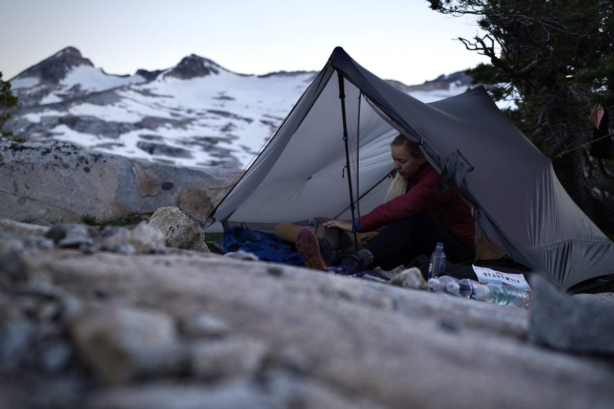 a gearjunkie tester in the gossamer gear the two backpacking tent while camping in california's sierra range