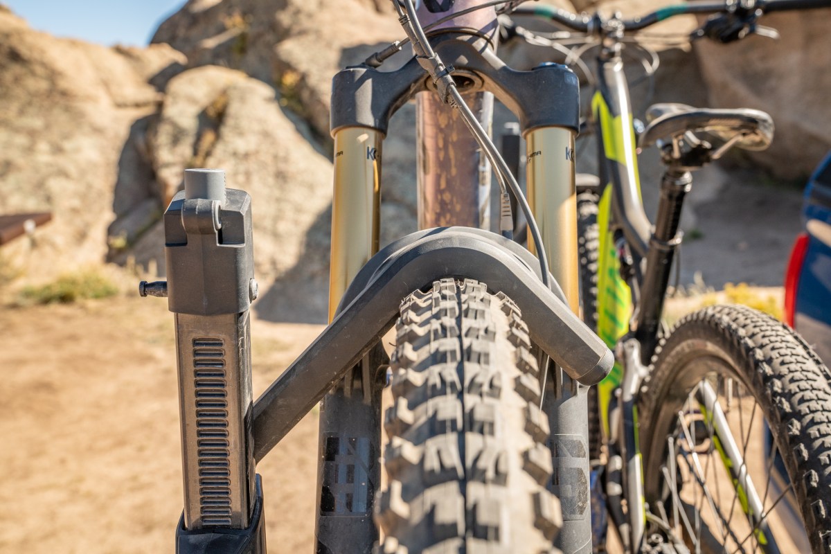 Platform racks, like the Yakima StageTwo, often have a secure arm with a front wheel hook that ratchets down on top of the tire; (photo/Eric Phillips)