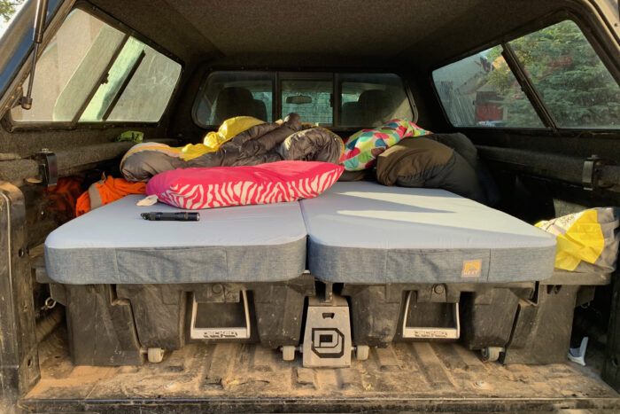 the Hest Dually mattress in the truck bed of gearjunkie tester sean mccoy