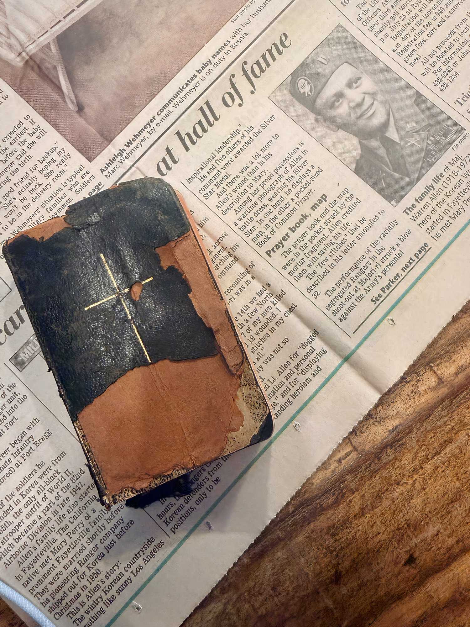 Tattered prayer book among a trove of items belong to late U.S. Army Major Warren Allen (Elly Watts).