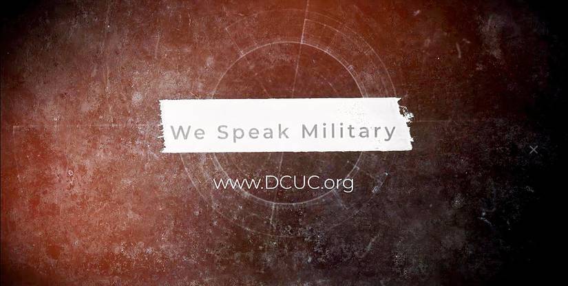 Defense Council Credit Union promotional campaign includes the statement, "We Speak Military" (DCUC).