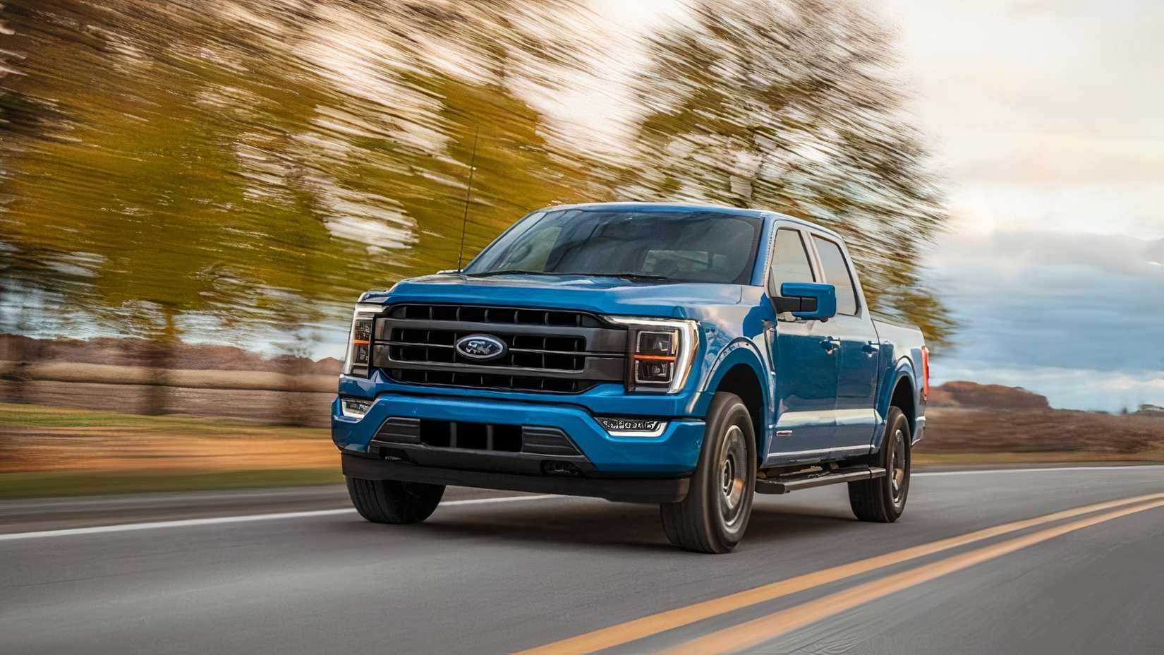 2021 Ford F-150 Powerboost Hybrid Blue Front Angle Driving
