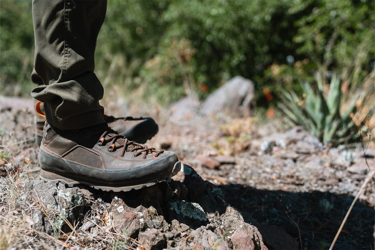 Crispi Alpine boot standing on rough rock along a dry trail