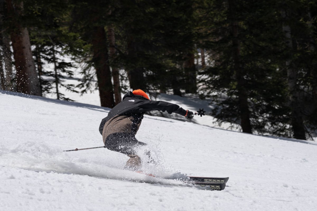 Man skiing on K2 Blur 79 skis near trees