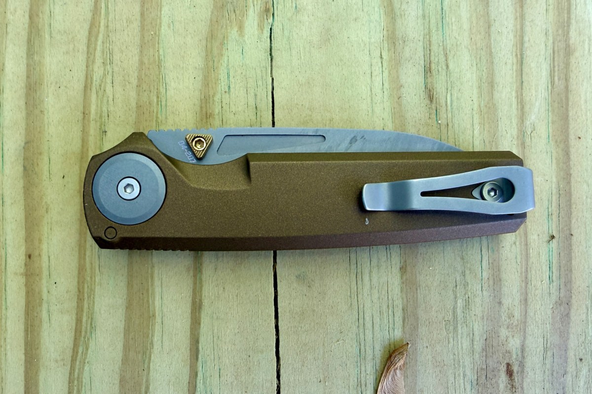 RMX Thumbstud knife shown closed with its pocket clip visible