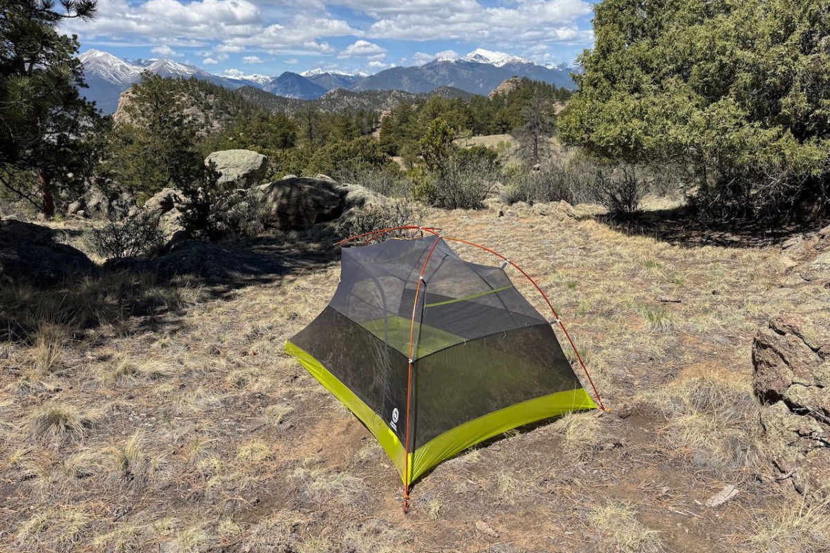 Big Agnes tent set up in an open campsite with mountain views in the background