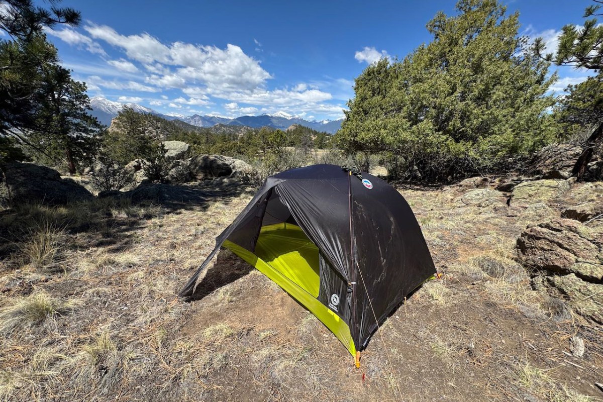 Tiger Wall UL2 Bikepack Tent with the rainfly vestibule open at a mountain campsite